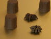 Honing Anijs Bonbon. Heerlijke romige chocolade die je niet kan laten liggen. Steranijs, honing, room, boter, melkchocolade, 36% cacao.